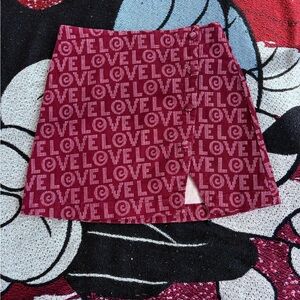 NWT URBAN OUTFITTERS ORANGE LOVE GRAPHIC SKIRT SIZE XS